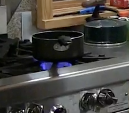 LakamiÌin still 7: Put pan on stove